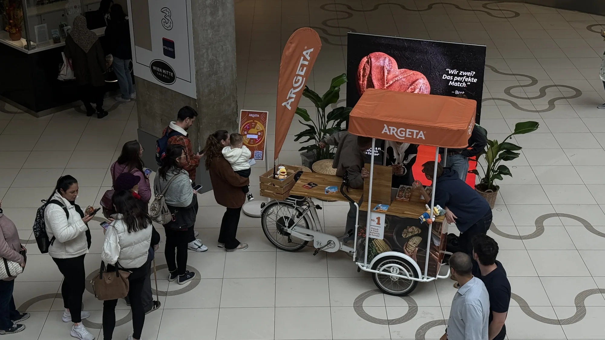 Argeta digital Spin the Wheel game at the promotion stand at Wien Mitte The Mall
