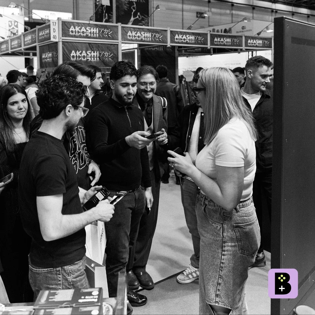Visitors at the interactive Spin the Wheel game at the FRIPAC-MEDIS booth